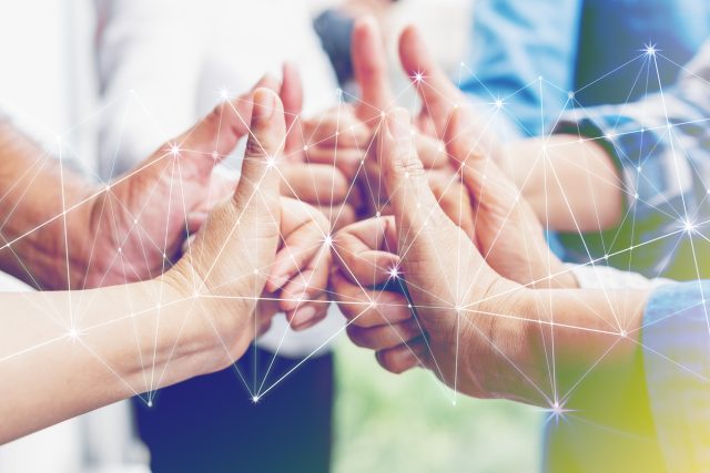 Business partners team achievement concept. Multi-ethnic diverse group of colleagues join hands together. Creative teamwork,business agreement. Important of teamwork. daadkracht